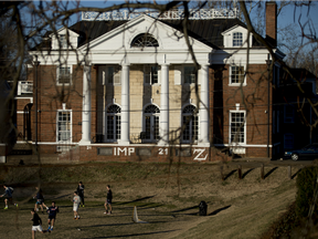 Students play soccer on the Madison Bowl field of the University of Virginia campus next to the Phi Kappa Psi fraternity in Charlottesville, Virginia, the fraternity referenced in Rolling Stone's article.