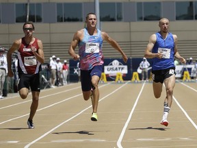 Trey Hardee, center, sprints to the finish line ahead of Harrison Williams, left, and Zach Ziemek, to win the third heat in the 100 meters of the Men's Decathlon at the USA Track and Field Championships, Thursday, June 22, 2017, in Sacramento, Calif. (AP Photo/Rich Pedroncelli)