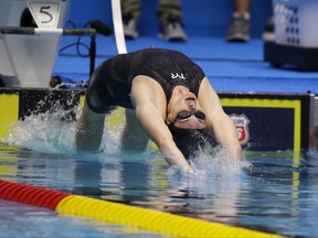 Hannah Stevens starts on her way to winning the women's 50-meter backstroke at the U.S. swimming national championships in Indianapolis, Thursday, June 29, 2017. (AP Photo/Michael Conroy)