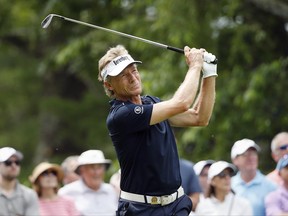 Bernhard Langer, of Germany, tees off on the third hole during the first round of the U.S. Senior Open golf tournament, Thursday, June 29, 2017, in Peabody, Mass. (AP Photo/Michael Dwyer)