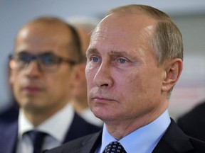 Russian President Vladimir Putin is seen in Izhevsk, Russia. Kremlin leaders are convinced America is intent on regime change in Russia, a fear that is feeding rising tension and military competition between the former Cold War foes, the Pentagon’s intelligence arm says in a new assessment