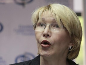 FILE - In this May 24, 2017 file photo, Venezuela's Chief Prosecutor Luisa Ortega Diaz speaks to the press from her office in Caracas, Venezuela. The country's Supreme Court said Tuesday, June 20, that it will allow judicial proceedings against the dissident chief prosecutor. (AP Photo/Fernando Llano, File)