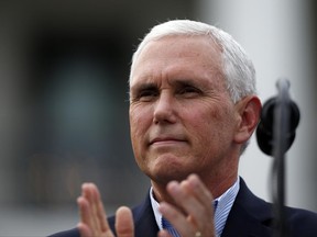 FILE- In this June 22, 2017, file photo, Vice President Mike Pence applauds during the Congressional Picnic on the South Lawn of the White House in Washington. Pence is scheduled to visit suburban Cleveland on Wednesday, June 28, to meet with small business owners. (AP Photo/Alex Brandon, File)