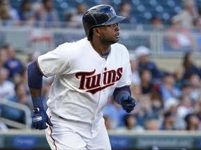 Minnesota Twins' Miguel Sano watches his two-run home run against the Chicago White Sox during the first inning of a baseball game Tuesday, June 20, 2017, in Minneapolis. (AP Photo/Bruce Kluckhohn)