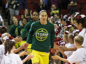 FILE - In this June 3, 2017, file photo, Sue Bird leads the Seattle Storm out for a WNBA basketball game against the Minnesota Lynx, in Seattle. The WNBA is bringing back its 3-point contest. For the first time since the 2009 All-Star Game the league will have a 3-point shootout during halftime of the game on July 22 in Seattle. "The 3-point contest is something we've had before and I've participated in," said Sue Bird. "It's fun and great for the fans and players. Everyone enjoys it." (Dean Rutz/The Seattle Times via AP, File)