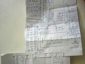 This sketch drawn by a former detainee shows the layout of the secret prison at Riyan Airport in the Yemeni city of Mukalla, in a May 20 2017 photo. Detainees were crammed into shipping containers, blindfolded for weeks, beaten regularly and left to suffer diarrhea, according to former prisoners. The drawing shows several containers and rooms for interrogation, part of a network of hidden prisons around southern Yemen into which hundreds seized in the hunt for al-Qaida have disappeared. (AP Photo/Maad El Zikry)