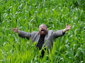 Brian Blessed stands inside a corn maze in 2014.