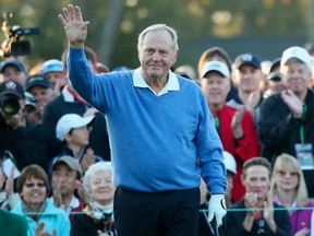 In this April 10, 2014 file photo, Jack Nicklaus waves to the crowd at the Masters.