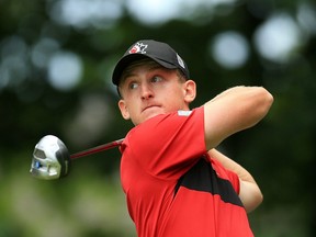 In this July 24, 2016 file photo, Canada's Jared du Toit tees off at the Canadian Open at Glen Abbey in Oakville, Ont.