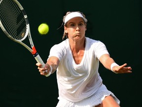 Bethanie Mattek-Sands plays a forehand during her singles match against Sorana Cirstea.