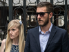 Chris Gard and Connie Yates, the parents of terminally ill toddler Charlie Gard, listen as a family friend addresses the media outside High Court on July 10, 2017 in London, England.
