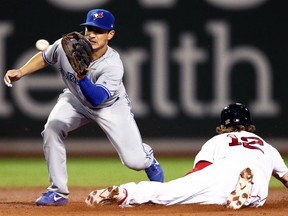 Brock Holt of the Red Sox steals second base past Darwin Barney of the Toronto Blue Jays during the seventh inning at Fenway Park in Boston on Wednesday night.