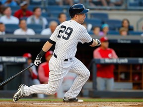 Todd Frazier of the New York Yankees ground into a second inning run scoring triple play against the Cincinnati Reds at Yankee Stadium on July 25, 2017 in the Bronx borough of New York City.