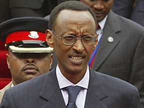 FILE - In this Tuesday May 22, 2007 file photo, Rwandan president Paul Kagame looks on during the COMESA conference in Nairobi, Kenya. President Paul Kagame of Rwanda is criticizing diplomats he accuses of meddling in the country's internal affairs. Kagame, who is seeking another term in elections scheduled for August, said on Rwanda Television Wednesday that it's "unacceptable" for Western diplomats to summon presidential candidates. (AP Photo/Sayyid Abdul Azim, File)