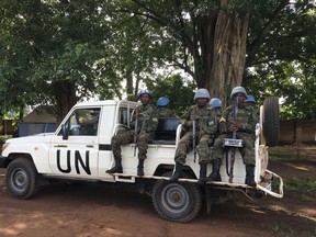 United Nations Peacekeepers drive in a truck in Yei, South Sudan, Thursday, July 13, 2017. The United Nations says it is considering putting a peacekeeping base in South Sudan's troubled Yei region, the first such expansion since civil war began in 2013. The peacekeeping mission's chief says Yei has "gone through a nightmare." Since fighting spread to the city a year ago, 70 percent of the population has fled. (AP Photo/Sam Mednick)