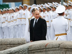Russian President Vladimir Putin attends a ceremony for Russia's Navy Day in Saint Petersburg on July 30, 2017.
