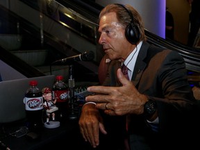 Alabama NCAA college football coach Nick Saban speaks with a radio show during the Southeastern Conference's annual media gathering, Wednesday, July 12, 2017, in Hoover, Ala. (AP Photo/Butch Dill)