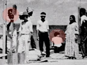 A newly unearthed photograph from the National Archives purportedly shows Amelia Earhart and Noonan - and their plane - on an atoll in the Marshall Islands.