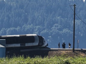 Emergency crews respond to the scene of a train derailment near Chambers Bay on Sunday, July 2, 2017, in Tacoma, Wash. There appear to be only minor injuries from the waterfront derailment of the Amtrak Cascades train near the town of Steilacoom, the Pierce County Sheriff's Office said on Twitter. The train runs between Vancouver, Canada, and Eugene-Springfield, Oregon. (Joshua Bessex/The News Tribune via AP)