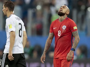 Chile's Arturo Vidal looks up at the end of the Confederations Cup final soccer match between Chile and Germany, at the St.Petersburg Stadium, Russia, Sunday July 2, 2017. Germany won 1-0. (AP Photo/Ivan Sekretarev)