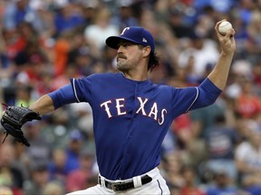 Texas Rangers starting pitcher Cole Hamels throws to the Los Angeles Angels in the second inning of a baseball game, Friday, July 7, 2017, in Arlington, Texas. (AP Photo/Tony Gutierrez)