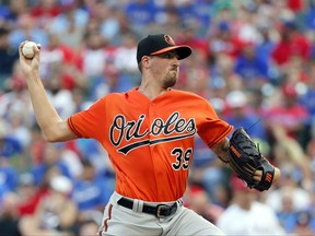 Baltimore Orioles starting pitcher Kevin Gausman throws to the Texas Rangers during the first inning of a baseball game, Saturday, July 29, 2017, in Arlington, Texas. (AP Photo/Tony Gutierrez)