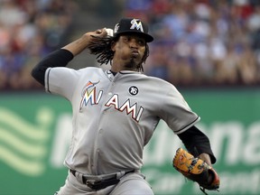 Miami Marlins starting pitcher Jose Urena throws to the Texas Rangers in the first inning of a baseball game, Wednesday, July 26, 2017, in Arlington, Texas. (AP Photo/Tony Gutierrez)
