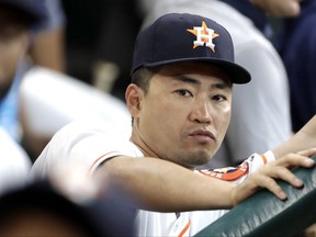 Houston Astros left fielder Norichika Aoki joins teammates in the dugout before a baseball game against the Oakland Athletics, Thursday, June 29, 2017, in Houston. Aoki is not in the starting lineup today. (AP Photo/David J. Phillip)