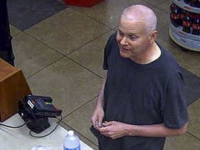 In this undated photo released by the FBI on July 14, 2017, Kentucky lawyer Eric Conn is seen on security footage at a New Mexico gas station. Conn, who pleaded guilty in March to stealing from the federal government and bribing a judge in a more than $500 million Social Security fraud case, disappeared June 2, a month before his sentencing. The FBI traced a truck he was driving to New Mexico, where it was abandoned, but said there is no indication that Conn has crossed into Mexico. (FBI via AP)