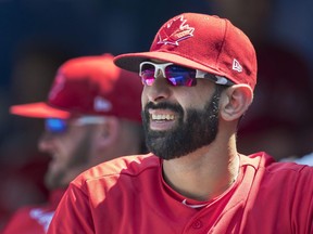 Toronto Blue Jays RF Jose Bautista watches from the bench during a July 30 game against the Los Angeles Angels.