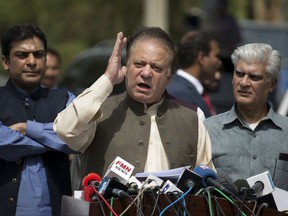 In this Thursday, June 15, 2017 photo, Pakistani Prime Minister Nawaz Sharif speaks to reporters outside the premises of the Joint Investigation Team, in Islamabad, Pakistan. Pakistan's supreme court on Friday, July 21, 2017, conducted its hearing into a high-profile case involving allegations of corruption against Sharif and his family but it wasn't immediately clear when a verdict would be announced, defense lawyers and attorneys for petitioners said. (AP Photo/B.K. Bangash)