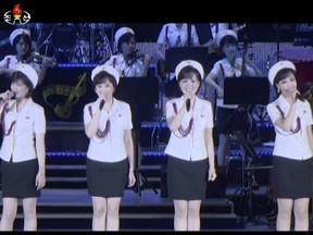 This image made from undated video of a news bulletin aired by North Korea's KRT on July 10, 2017, North Korea's Moranbong Band, an all-female ensemble that was hand-picked by leader Kim Jong Un, performs in Pyongyang. Kim attended a concert replete with pop music and thunderous applause to fete the successful launch of his country's first intercontinental ballistic missile. Independent journalists were not given access to cover the event depicted in this photo. (KRT via AP Video)