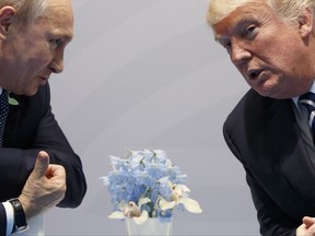FILE - In this July 7, 2017, file photo, U.S. President Donald Trump, right, meets with Russian President Vladimir Putin at the G20 Summit in Hamburg, Germany. Six months into his presidency, Donald Trump has made clear who he considers to be his friends, and his foes, on the international stage. (AP Photo/Evan Vucci, File)
