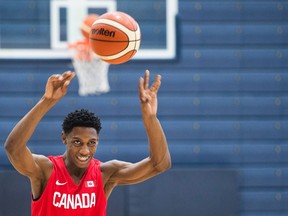 In this June 20 file photo, R.J. Barrett passes the ball at a U-19 Team Canada basketball practice in Mississauga, Ont.