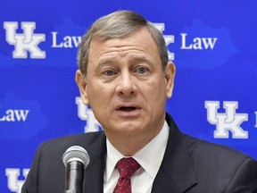 FILE - In this Wednesday, Feb. 1, 2017, file photo, Chief Justice John Roberts speaks at the The John G. Heyburn II Initiative and University of Kentucky College, Wednesday, Feb. 1, 2017, in Lexington, Ky. Speaking at an event at the Victoria University of Wellington in New Zealand, Roberts said Wednesday he thinks rapidly advancing technology poses one of the biggest challenges for the high court. (AP Photo/Timothy D. Easley, File)