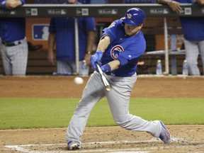 FILE - In this June 25, 2017, file photo, Chicago Cubs' Miguel Montero hits a single during the fifth inning of a baseball game against the Miami Marlins in Miami. Montero has been acquired by the Toronto Blue Jays from the Cubs, six days after he blamed Chicago pitcher Jake Arrieta for allowing seven stolen bases in a 6-1 loss to Washington. (AP Photo/Lynne Sladky, File)