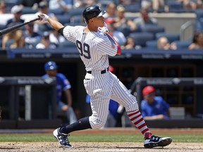 New York Yankees' Aaron Judge hits a solo home run during the fourth inning of a baseball game against the Toronto Blue Jays in New York, Tuesday, July 4, 2017. (AP Photo/Kathy Willens)