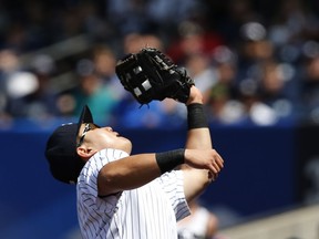 New York Yankees first baseman Ji-Man Choi, of South Korea, fields a foul ball by Kendrys Morales for an out during the fourth inning of a baseball game against the Toronto Blue Jays in New York, Wednesday, July 5, 2017. (AP Photo/Kathy Willens)