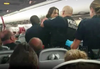 Brandon Courneyea was charged after a disturbance on an Air Canada flight.