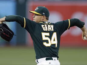 Oakland Athletics pitcher Sonny Gray works against the Atlanta Braves during the first inning of a baseball game Friday, June 30, 2017, in Oakland, Calif. (AP Photo/Ben Margot)