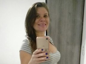 In this photo released by Klebsom Cosme, Claudineia dos Santos Melo takes a selfie in Rio de Janeiro, Brazil. Claudineia dos Santos Melo was 35 weeks into her pregnancy when she was caught in a crossfire in the Duque de Caxias slum, of the metropolitan Rio de Janeiro area. According to doctors, a bullet entered the side of her hip perforating her uterus and critically injuring the baby inside her womb. Doctors performed a c-section to deliver baby Arthur and said that he was on life support with serious injuries to his lungs and spine.  (AP Photo/Klebsom Cosme)