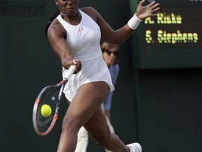 Sloane Stephens of the United States returns to Alison Riske of the United States during their Women's Singles Match on day two at the Wimbledon Tennis Championships in London Tuesday, July 4, 2017. (AP Photo/Tim Ireland)