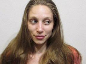 This booking photo released by the Rochester, N.H., Police Department on its Facebook page shows Joanne Shaw, charged with attempting to kidnap a baby girl from a vehicle Saturday, July 22, 2017, after the child's father stopped to offer her a ride. (Rochester Police Department via AP)