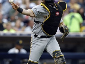 Pittsburgh Pirates catcher Francisco Cervelli throws out San Diego Padres' Jabari Blash at first base after a strikeout during the fourth inning of a baseball game in San Diego, Saturday, July 29, 2017. (AP Photo/Alex Gallardo)