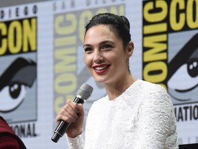 Gal Gadot speaks at the Warner Bros. "Justice League" panel on day three of Comic-Con International on Saturday, July 22, 2017, in San Diego, Calif. (Photo by Richard Shotwell/Invision/AP)