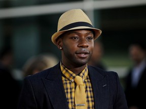 FILE - In this June 21, 2011 file photo, Nelsan Ellis arrives at the premiere for the fourth season of HBO's "True Blood" in Los Angeles. Ellis, best known for playing the character of Lafayette Reynolds on "True Blood," has died at the age of 39. Ellis' manager Emily Gerson Saines confirmed the actor's death in an email Saturday, July 8, 2017. (AP Photo/Matt Sayles, File)