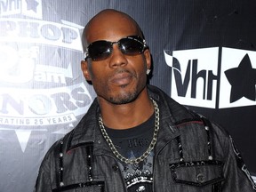 FILE - In this Sept. 23, 2009 photo, DMX arrives at the 2009 VH1 Hip Hop Honors at the Brooklyn Academy of Music, in New York. DMX has been arrested in New York Thursday, July 13, 2017, on federal tax fraud charges. Prosecutors say the rapper, whose given name is Earl Simmons, owes $1.7 million in taxes and has engaged in a multi-year scheme to conceal millions of dollars of income from the Internal Revenue Service. (AP Photo/Peter Kramer, File)