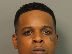 FILE- This Sunday, July 2, 2017, file photo provided by the Jefferson County Sheriff shows Ricky Hampton, also known as Finese2Tymes. A bodyguard has been charged with illegally providing a firearm to the rapper and convicted felon, Hampton, who was performing when gunfire broke out at an Arkansas nightclub, while federal officials say one of the guard's guns matched a shell casing found at the scene. No one has been charged in the July 1 shooting at the Power Ultra Lounge, which left more than two dozen people injured. (Jefferson County Sheriff via AP, File)