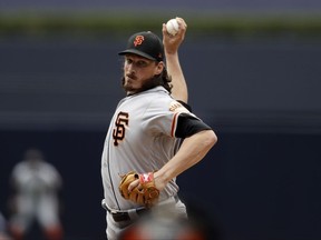 San Francisco Giants starting pitcher Jeff Samardzija works against a San Diego Padres batter during the first inning of a baseball game, Sunday, July 16, 2017, in San Diego. (AP Photo/Gregory Bull)