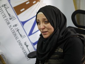 In this March 13, 2017 photo, Syrian-American Rania Kisar, talks to The Associated Press, in Istanbul, Turkey. Running a school in the Idlib province in northwest Syria, controlled by Syria's al-Qaida affiliate, Kisar has become skilled in getting her way, either by negotiating with the militants or by pushing back against them. (AP Photo/Sam McNeil)